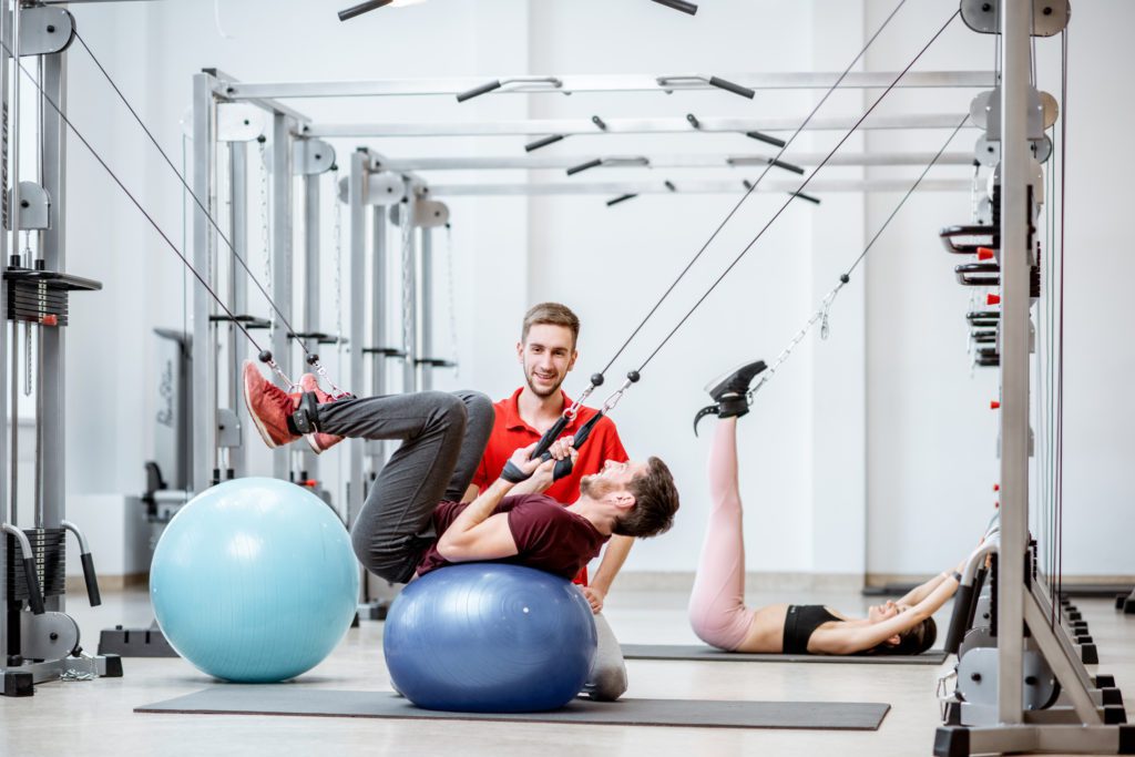 post injury spine treatment in a rehabilitation gym room